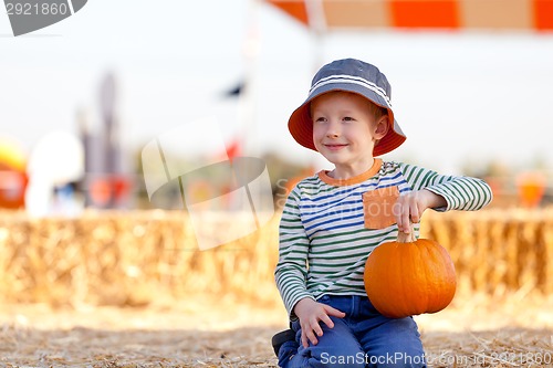 Image of boy at pumpkin patch