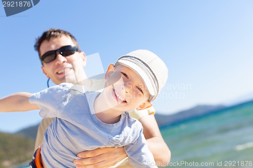 Image of family at lake vacation