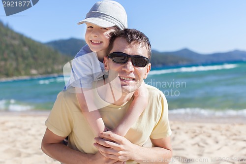 Image of family at lake vacation