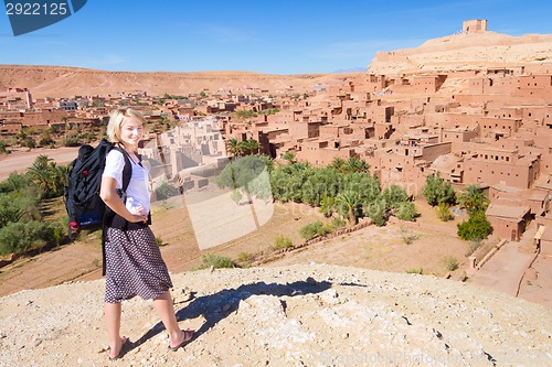 Image of Traveler in front of  Ait Benhaddou, Morocco.