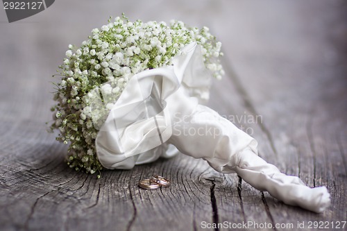 Image of Wedding bouquet and rings.
