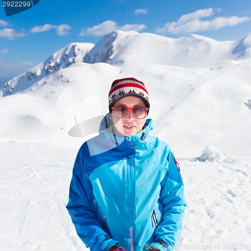 Image of Active woman skiing.