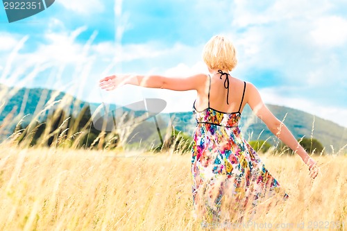 Image of Woman enjoying the nature.