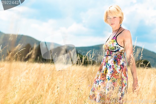 Image of Woman enjoying the nature.