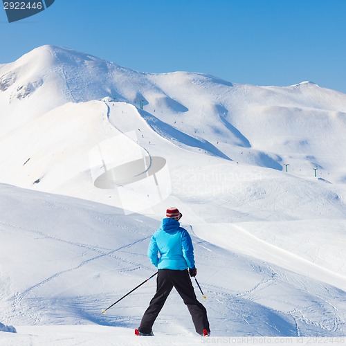 Image of Woman skier.