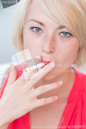 Image of Lady smoking.