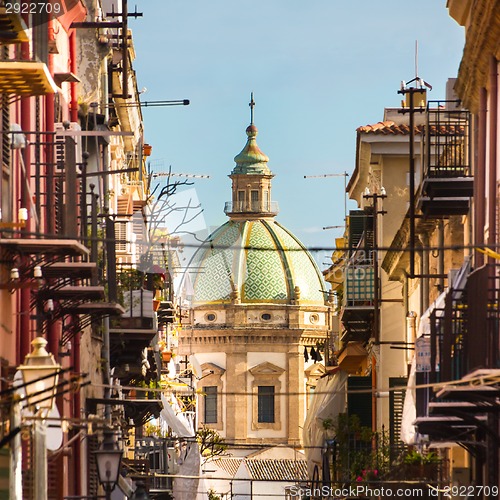 Image of Traditional Italian medieval narrov street in Plermo.