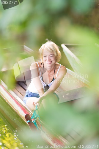 Image of Woman enjoing the sunny summer day,