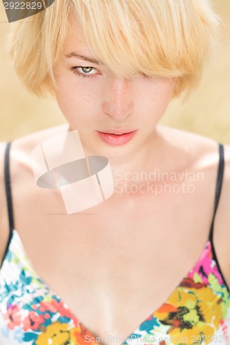 Image of A portrait of beautiful young Caucasian woman outdoor.