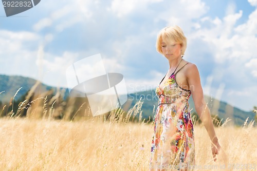Image of Woman enjoying the nature.