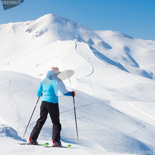 Image of Woman skier.