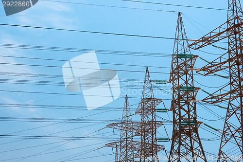 Image of High-voltage power transmission towers.