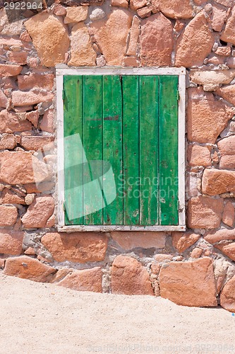 Image of Old green window.
