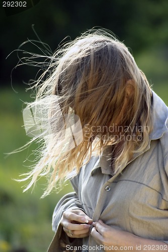Image of The girl with fluttering hair