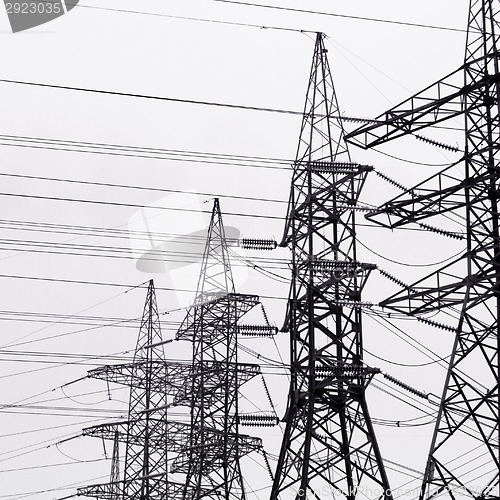 Image of High-voltage power transmission towers.
