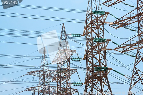 Image of High-voltage power transmission towers.