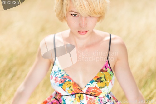 Image of A portrait of beautiful young Caucasian woman outdoor.