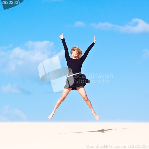 Image of Girl jumping in the air