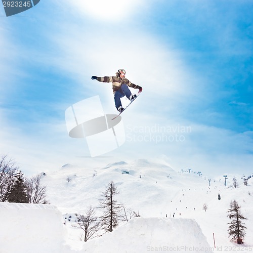 Image of Free style snowboarder
