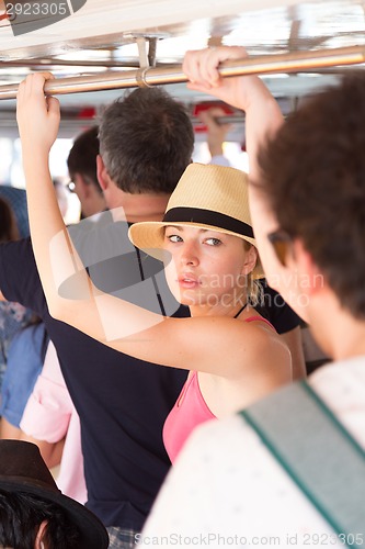 Image of Tourist traveling by public transport.