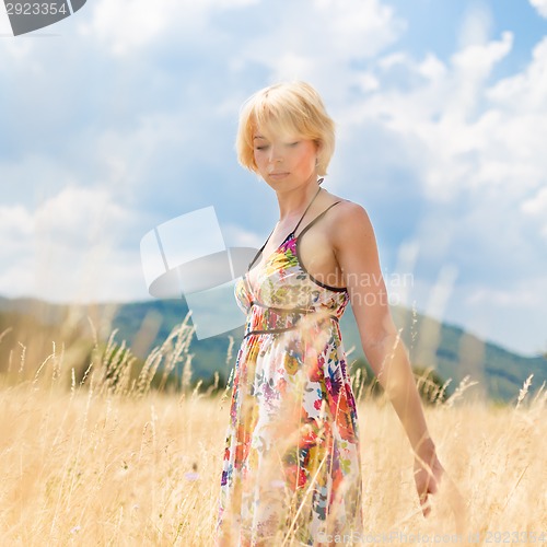 Image of Woman enjoying the nature.