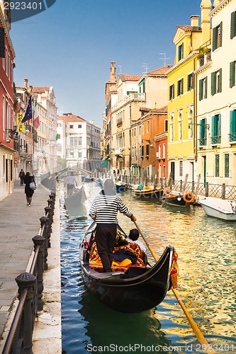 Image of Gondolas on canal in Venice, Italy