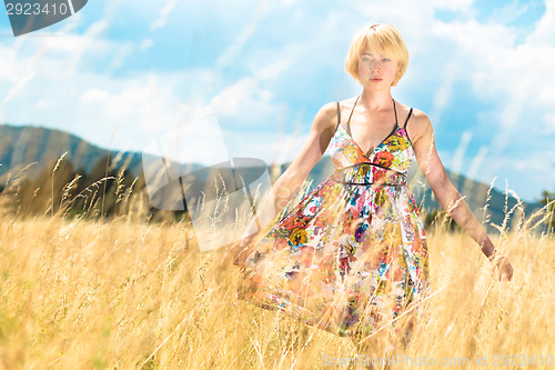 Image of Woman enjoying the nature.