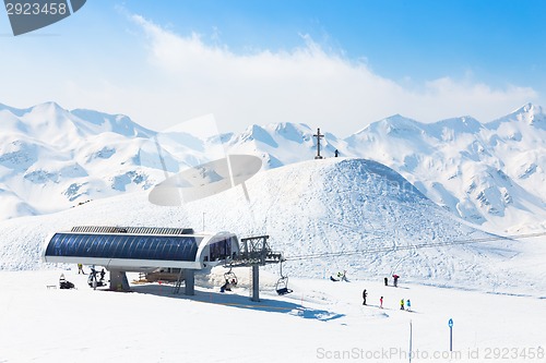 Image of Skiers on ski lift at Vogel, Slovenia.