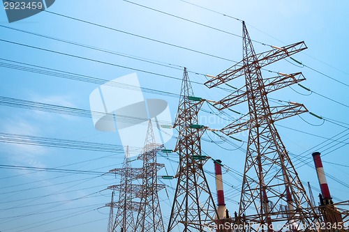 Image of High-voltage power transmission towers.