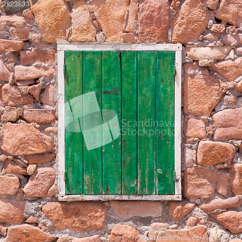 Image of Old green window.