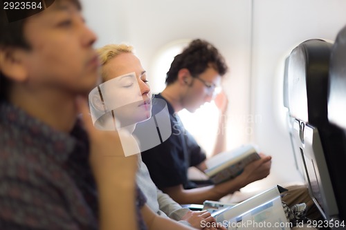 Image of People flying by plane.