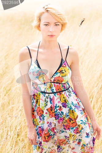 Image of A portrait of beautiful young Caucasian woman outdoor.