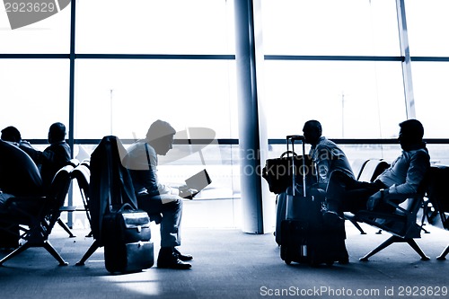 Image of People traveling on airport silhouettes