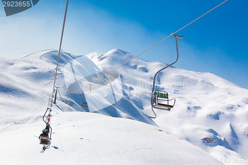 Image of Skiers on ski lift at Vogel, Slovenia.