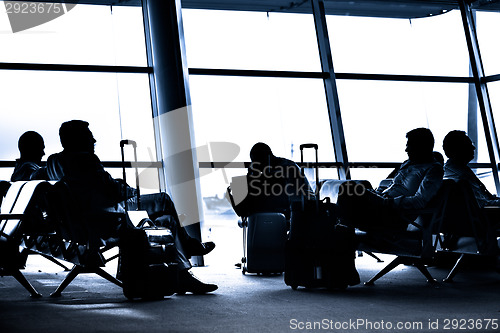 Image of People traveling on airport silhouettes