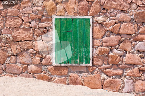 Image of Old green window.