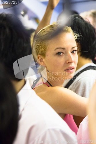 Image of Tourist traveling by public transport.