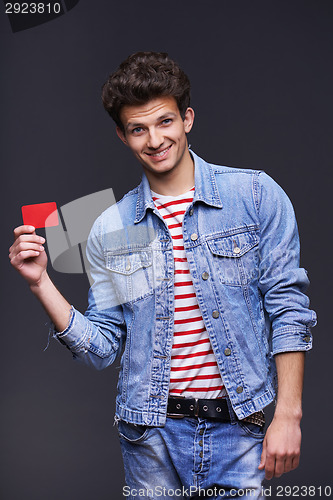 Image of Denim man showing empty paper card