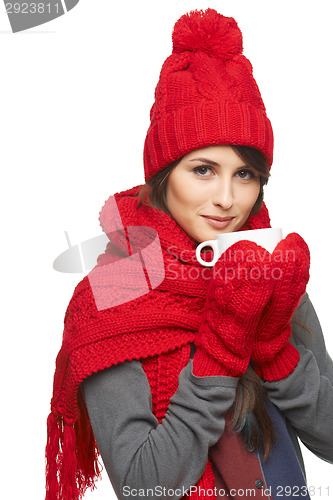 Image of Winter woman holding tea cup