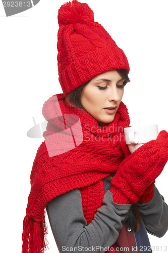 Image of Winter woman holding tea cup