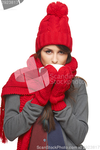 Image of Winter woman holding tea cup