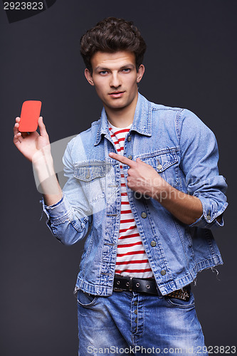 Image of Denim man showing empty paper card