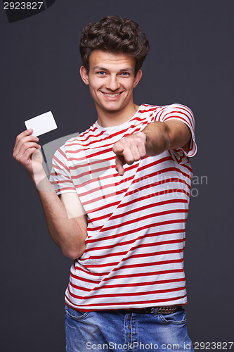 Image of Man showing empty blank paper card sign