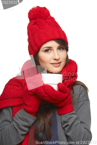 Image of Winter woman holding tea cup