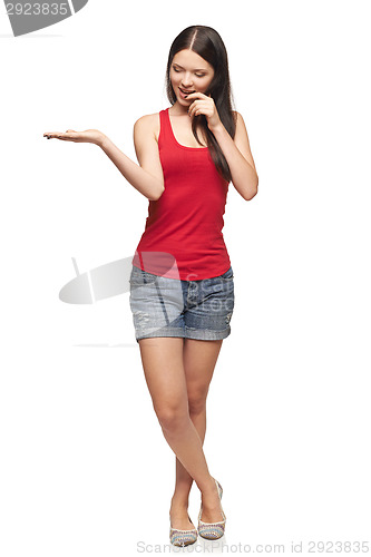 Image of Woman showing blank copy space on the palm