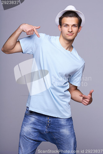 Image of Fashion man pointing at himself