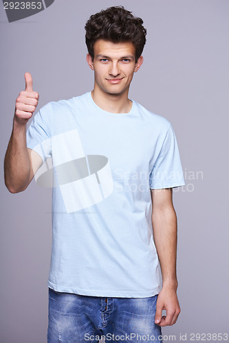 Image of Handsome man in blank blue t-shirt