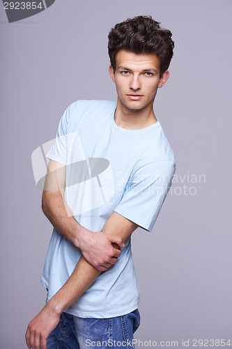 Image of Handsome man in blank blue t-shirt