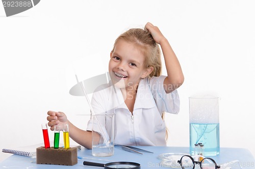 Image of Joyful schoolgirl in chemistry class