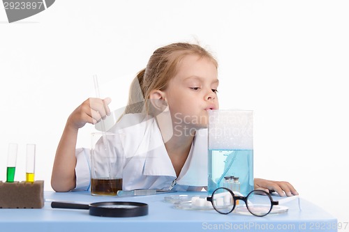 Image of Trainee smelling liquid in chemistry class